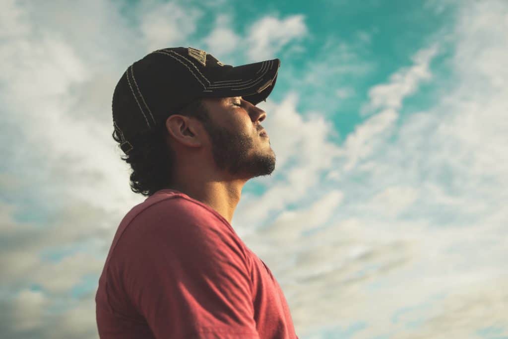 man looking toward heaven